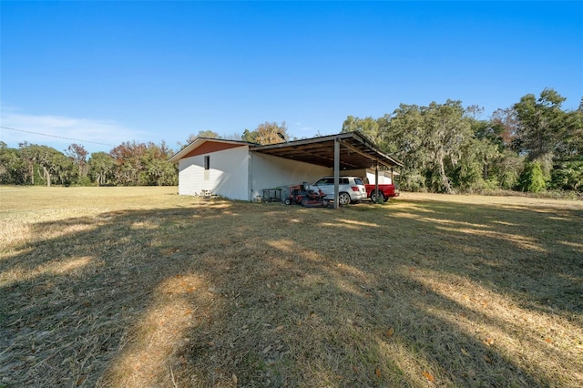 view of yard featuring a carport