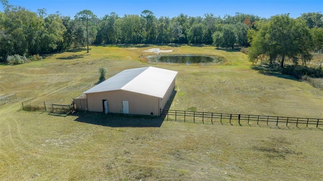 bird's eye view with a rural view and a water view