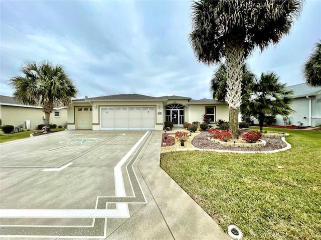 ranch-style house featuring a garage and a front lawn