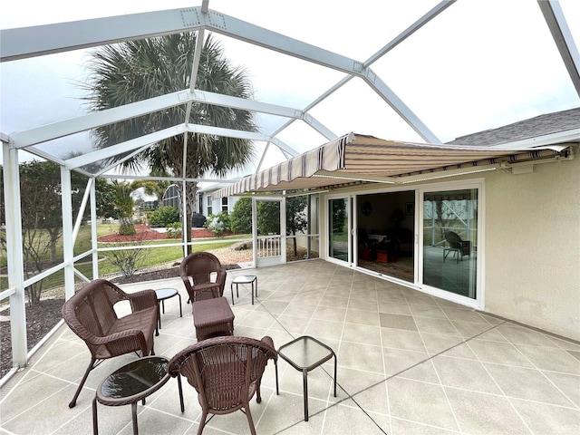 unfurnished sunroom featuring vaulted ceiling