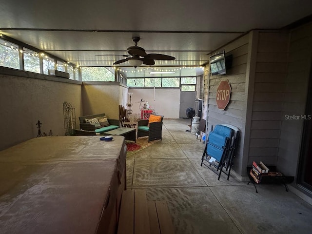 interior space featuring ceiling fan