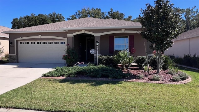 ranch-style home with a front yard and a garage