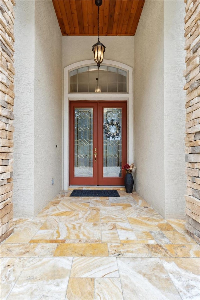 property entrance with french doors