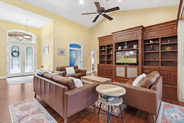 living room with french doors, ceiling fan, dark hardwood / wood-style flooring, and high vaulted ceiling