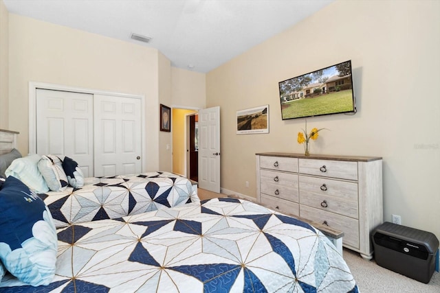 carpeted bedroom featuring a closet