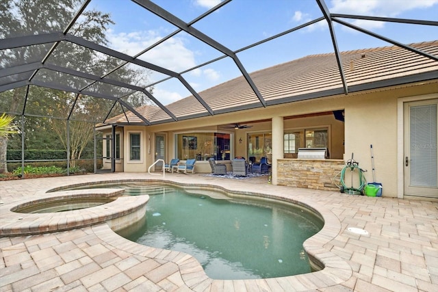 view of pool with a lanai, an outdoor bar, an in ground hot tub, an outdoor living space, and a patio