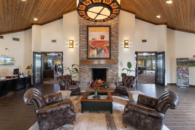 living room with wood ceiling, a stone fireplace, high vaulted ceiling, and crown molding