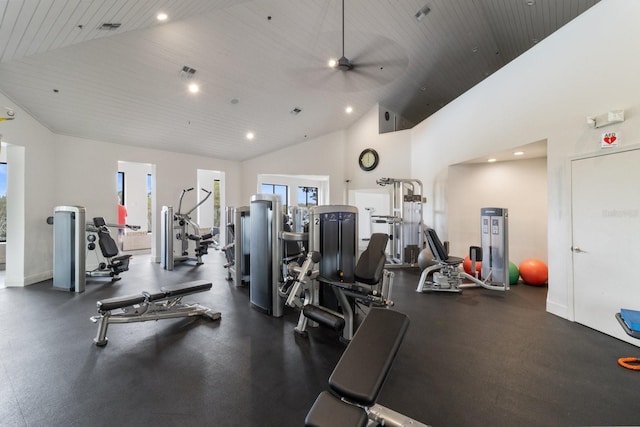 exercise room with vaulted ceiling, a healthy amount of sunlight, ceiling fan, and wood ceiling