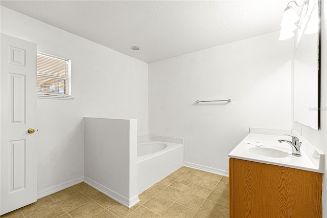 bathroom with vanity and a tub to relax in