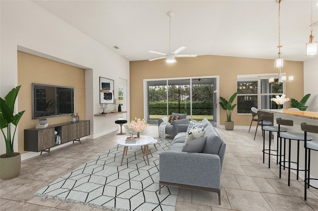 tiled living room featuring vaulted ceiling