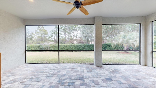 unfurnished sunroom featuring a healthy amount of sunlight