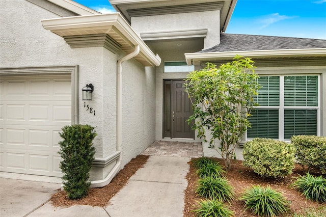 entrance to property with a garage