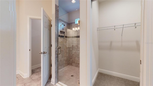 bathroom featuring an enclosed shower