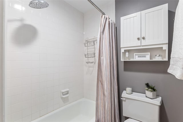 bathroom with toilet and shower / tub combo