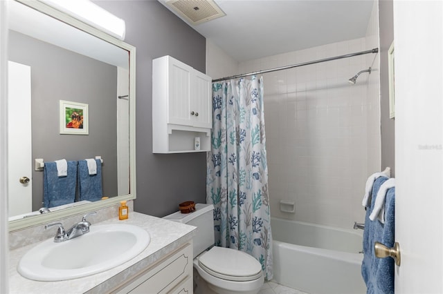 full bathroom featuring toilet, vanity, and shower / bath combo with shower curtain