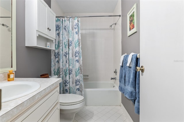 full bathroom with tile patterned floors, toilet, vanity, and shower / bath combo