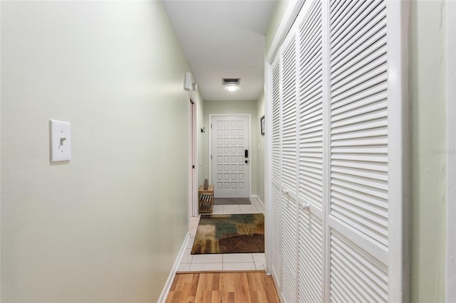 corridor featuring light wood-type flooring