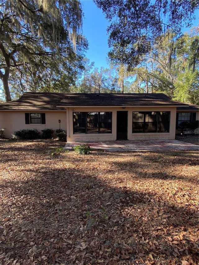 back of house featuring a patio area