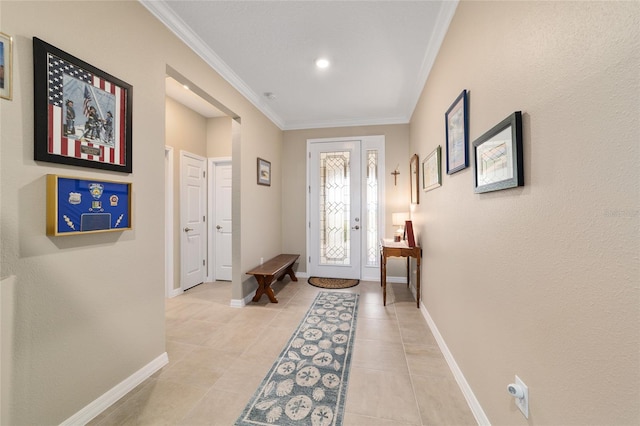 tiled entryway with ornamental molding