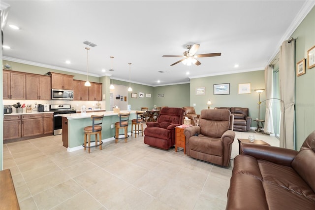 tiled living room featuring ceiling fan and ornamental molding