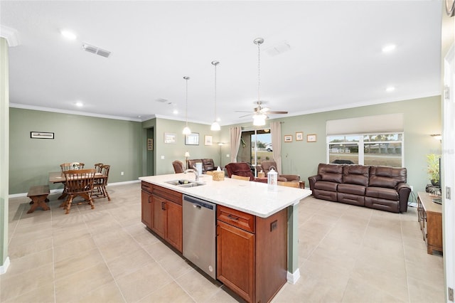 kitchen featuring dishwasher, ceiling fan, hanging light fixtures, sink, and a center island with sink