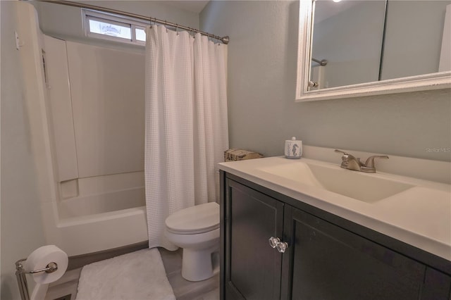 full bathroom with shower / bath combination with curtain, vanity, and toilet