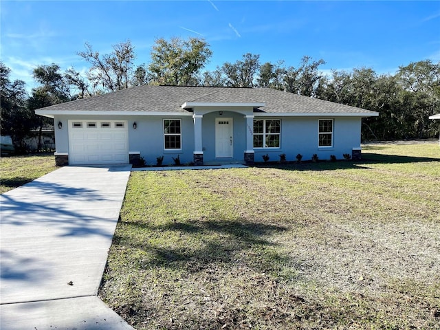 single story home with a garage and a front yard