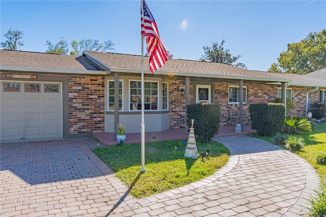 ranch-style home with a garage