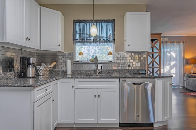 kitchen featuring white cabinetry, sink, and stainless steel dishwasher