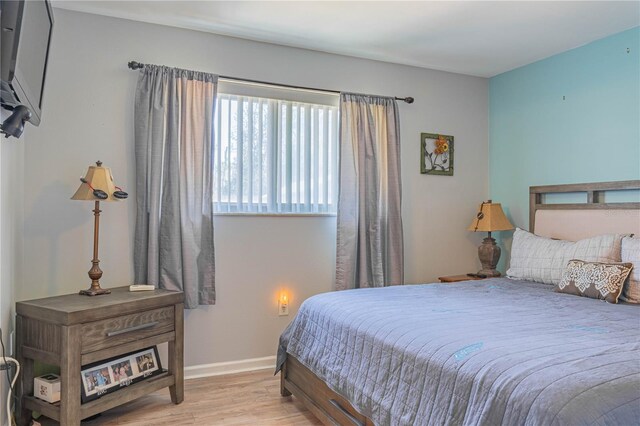 bedroom featuring light wood-type flooring