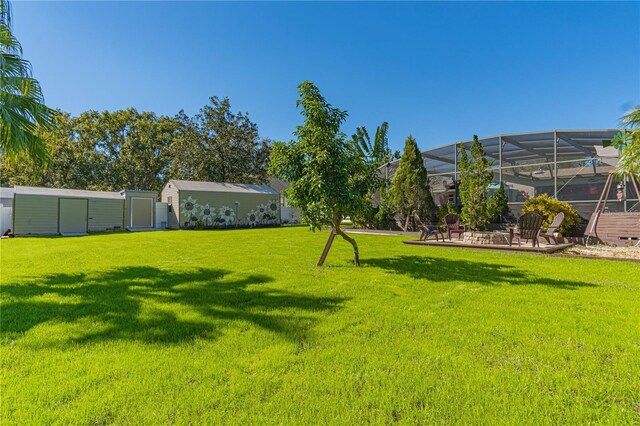 view of yard featuring a lanai