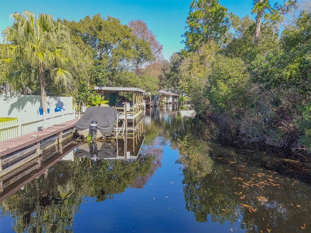 dock area featuring a water view