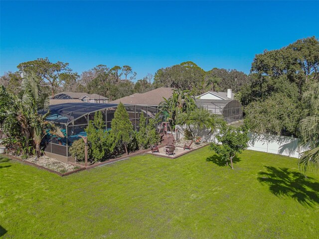 view of yard featuring a lanai