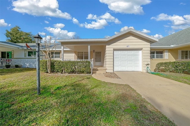 ranch-style house with a garage and a front yard