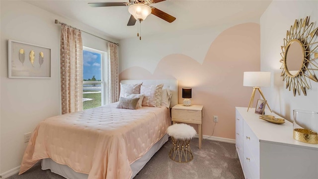 bedroom featuring ceiling fan and dark colored carpet