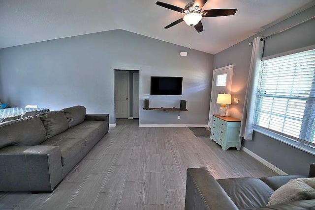 living room with vaulted ceiling and ceiling fan