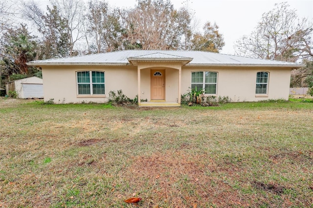 ranch-style house with a front lawn