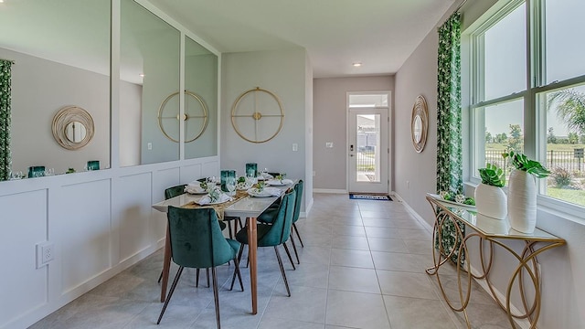 tiled dining area with a wealth of natural light