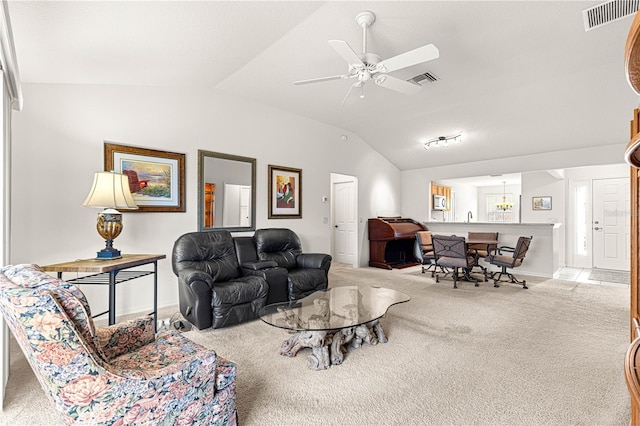 living room with light carpet, lofted ceiling, and ceiling fan