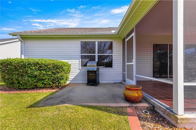 exterior space featuring a yard and a patio area