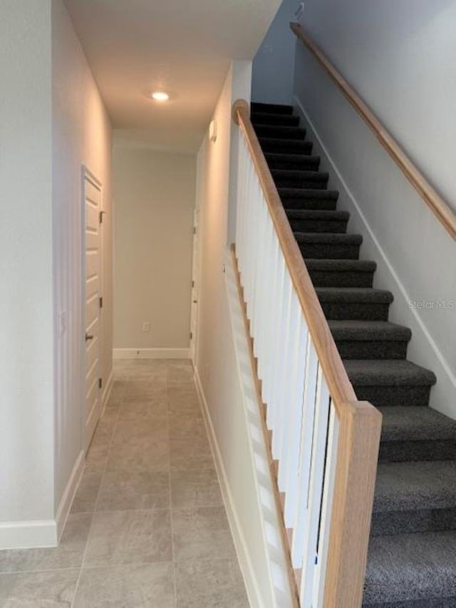 2214 NW 23rd Loop, Ocala, FL 34475 - staircase featuring baseboards and recessed lighting