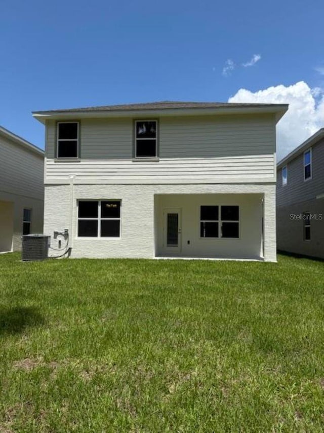 2214 NW 23rd Loop, Ocala, FL 34475 - back of property with a lawn