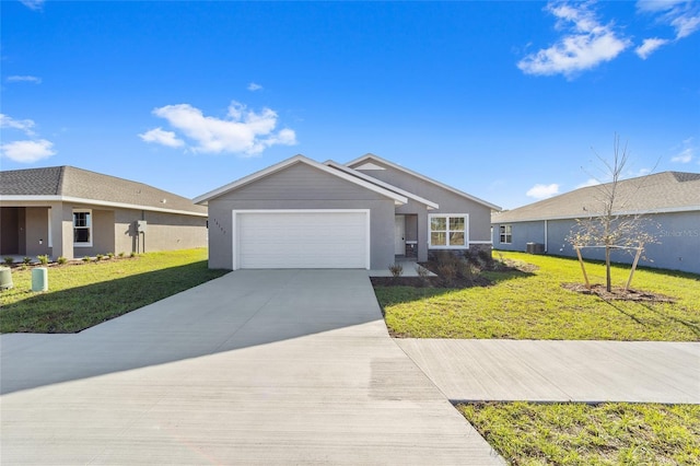 ranch-style home with a garage and a front yard