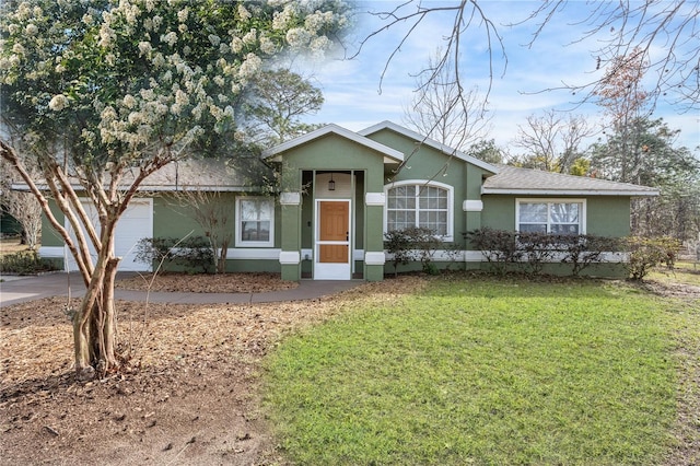 ranch-style house with a front lawn and a garage