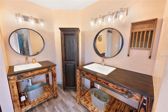 bathroom featuring wood-type flooring and vanity