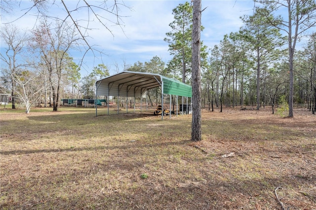 view of yard featuring a carport