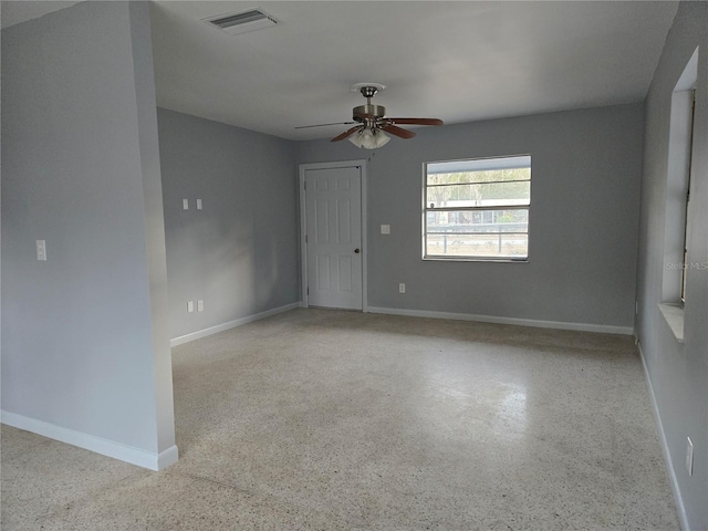 unfurnished room featuring ceiling fan