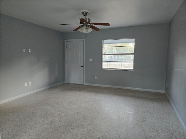 spare room featuring ceiling fan