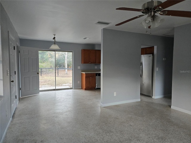 unfurnished living room with ceiling fan