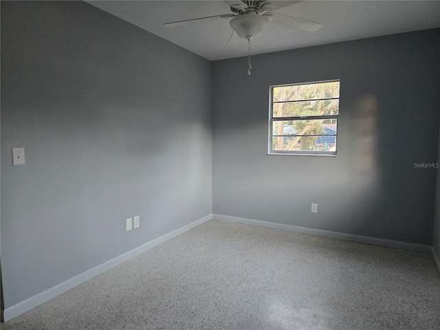 empty room featuring ceiling fan